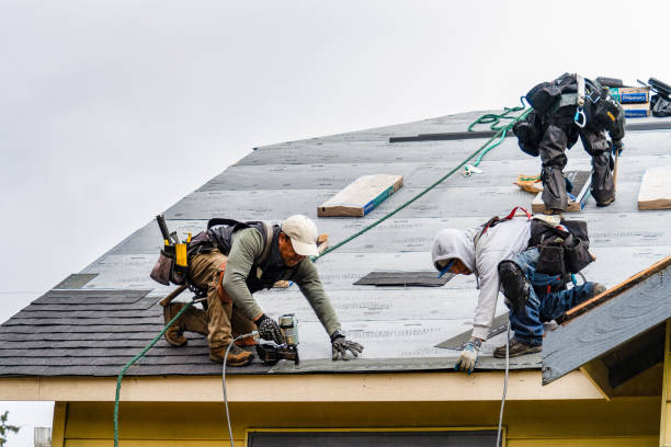 Professional Gutter Installation technician working in Pownal, VT